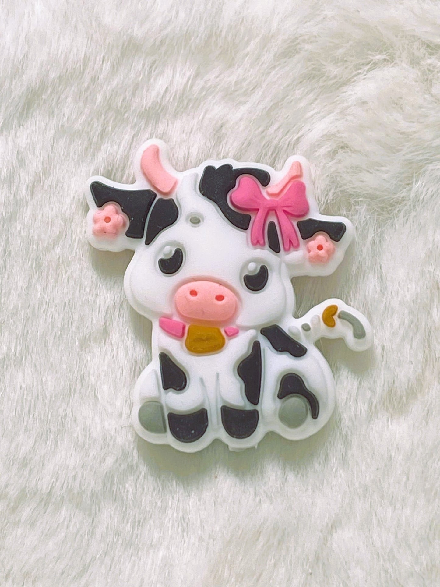 cute cow with pink bow